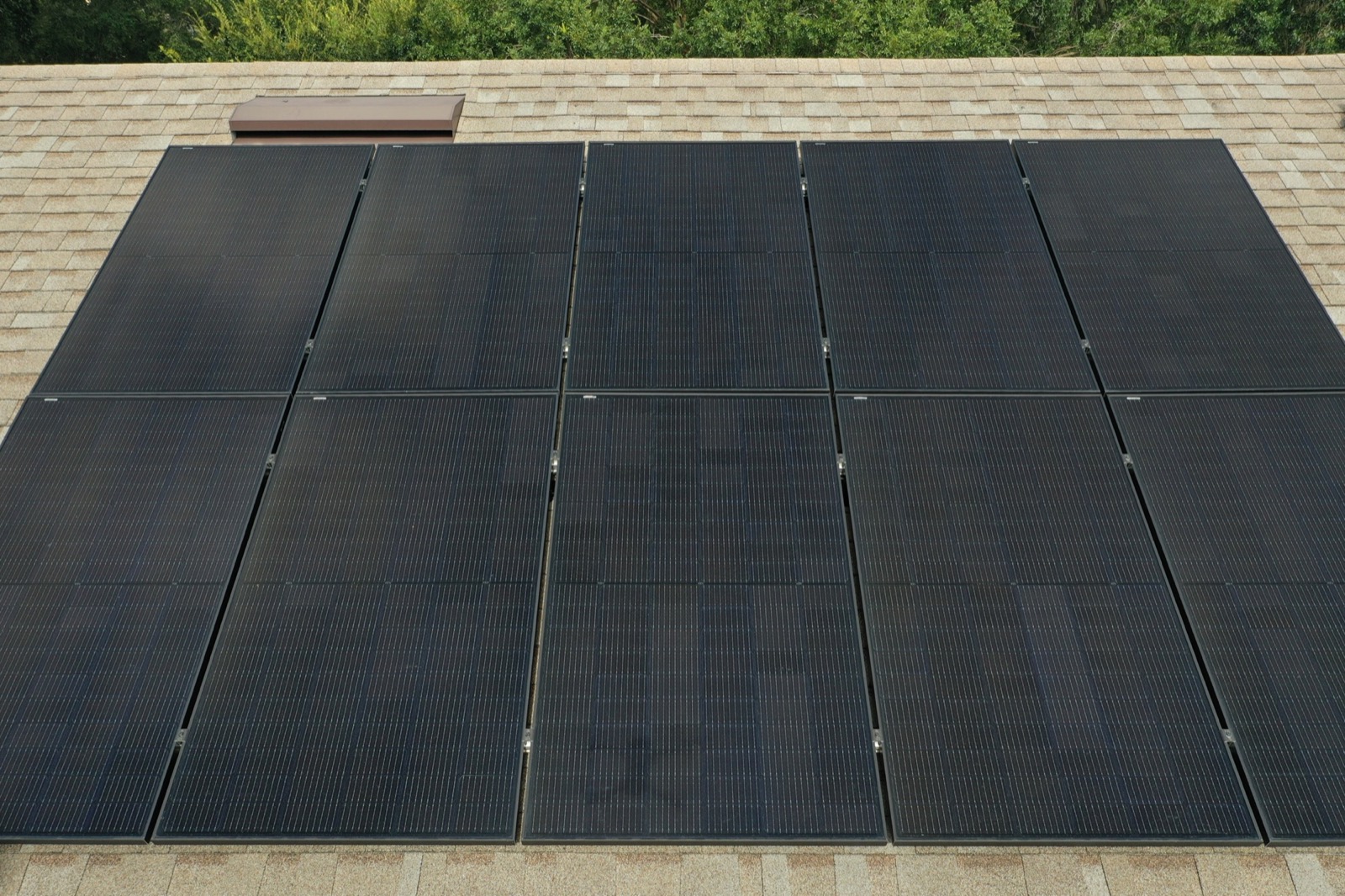 Close view of solid-black solar panels installed on a Florida roof
