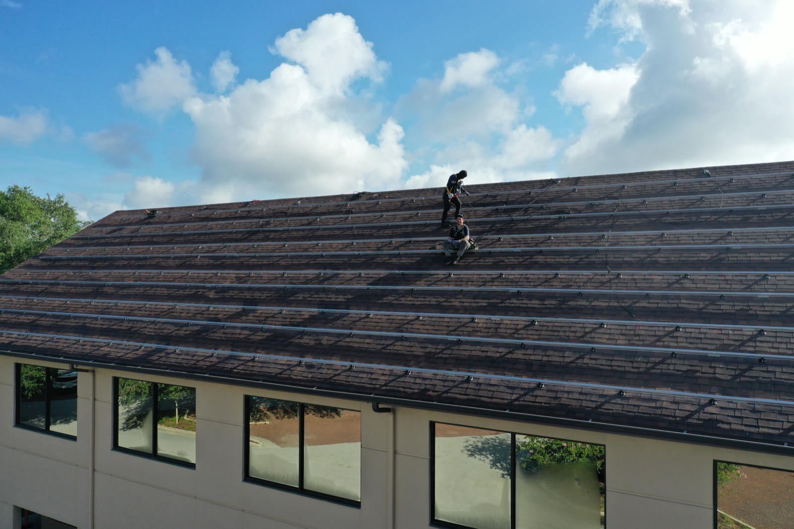 Solar mounting rails installed across the first St. Luke's roof