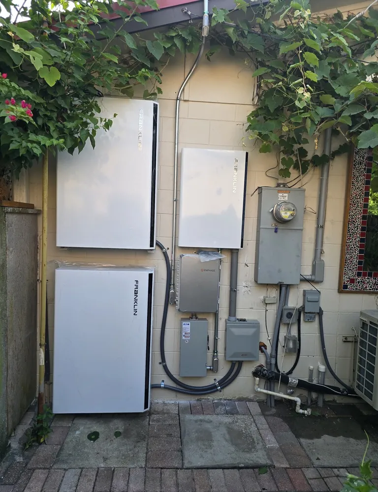 Three FranklinWH home batteries with electrical equipment