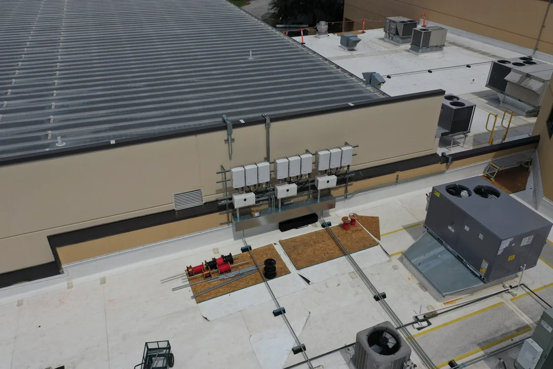 Inverter equipment and conduit installed along the St. Luke’s building on Day 12